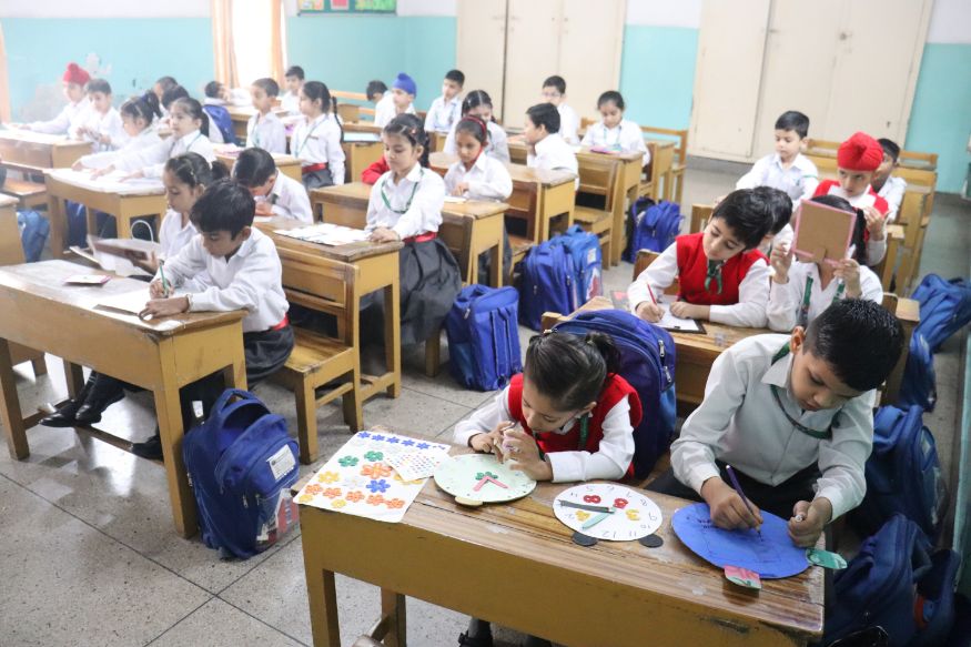 STUDENTS ENHANCE THEIR COGNITIVE SKILLS WITH CLOCK MAKING ACTIVITY